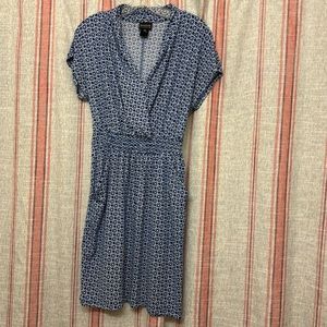 Blue and white patterned dress. Has pockets